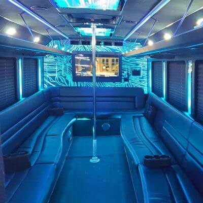 24 passenger bus with leather benches and entertainment system